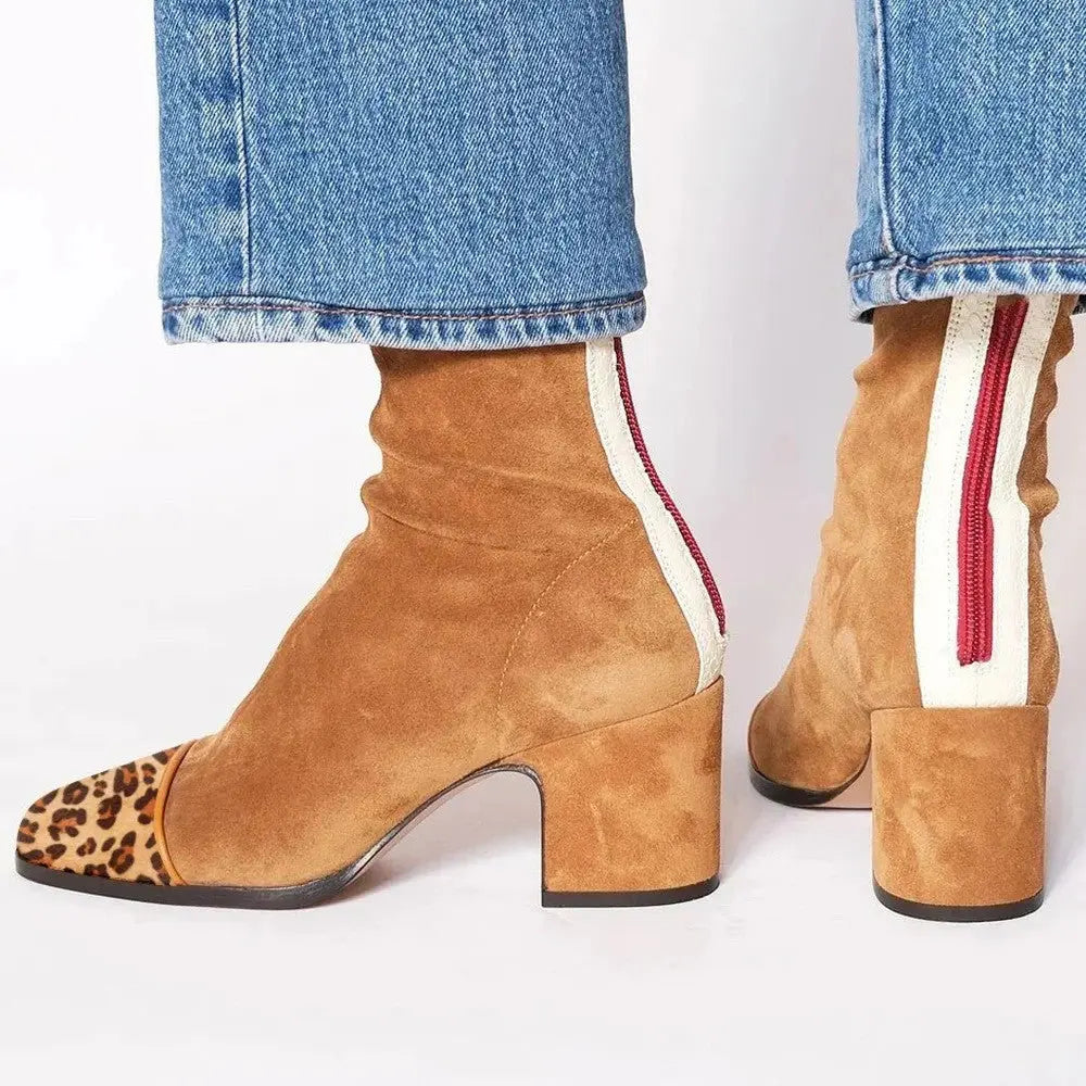 Trendy burgundy ankle boots with a supportive insole, ideal for all-day wear and winter outings.