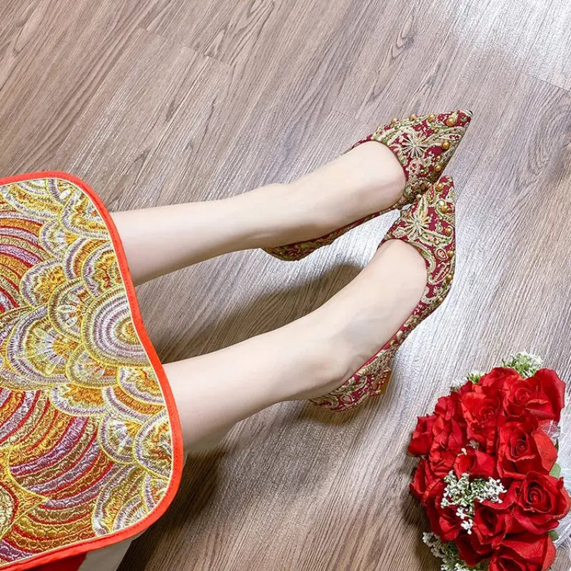Pointed-toe bridal shoes showcasing exquisite craftsmanship and design.