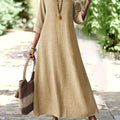 Whisper-Soft Olive Dress styled with accessories for a chic day look.