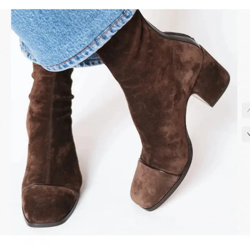 Chic cream square-toe boots designed for comfort and elegance, suitable for any occasion.