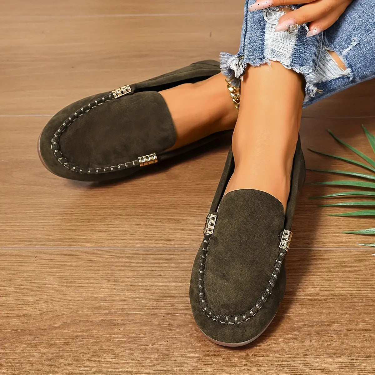 Close-up of the supple fabric upper of whisper-soft loafers.