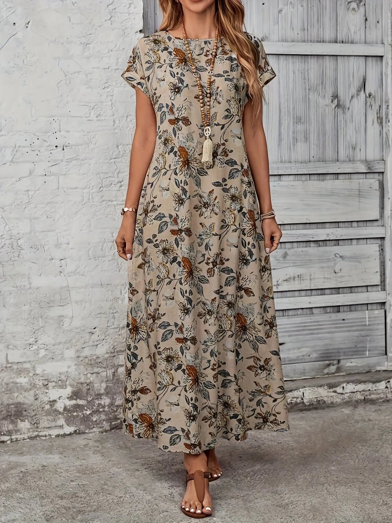 Model wearing the Whisper-Soft Floral Dress, showcasing its flattering A-line silhouette and stretchable fit.