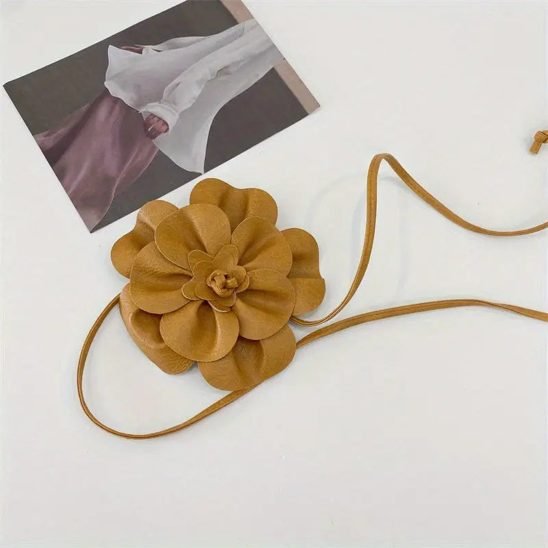 Versatile floral belt, seamlessly complements party dresses and casual outfits.