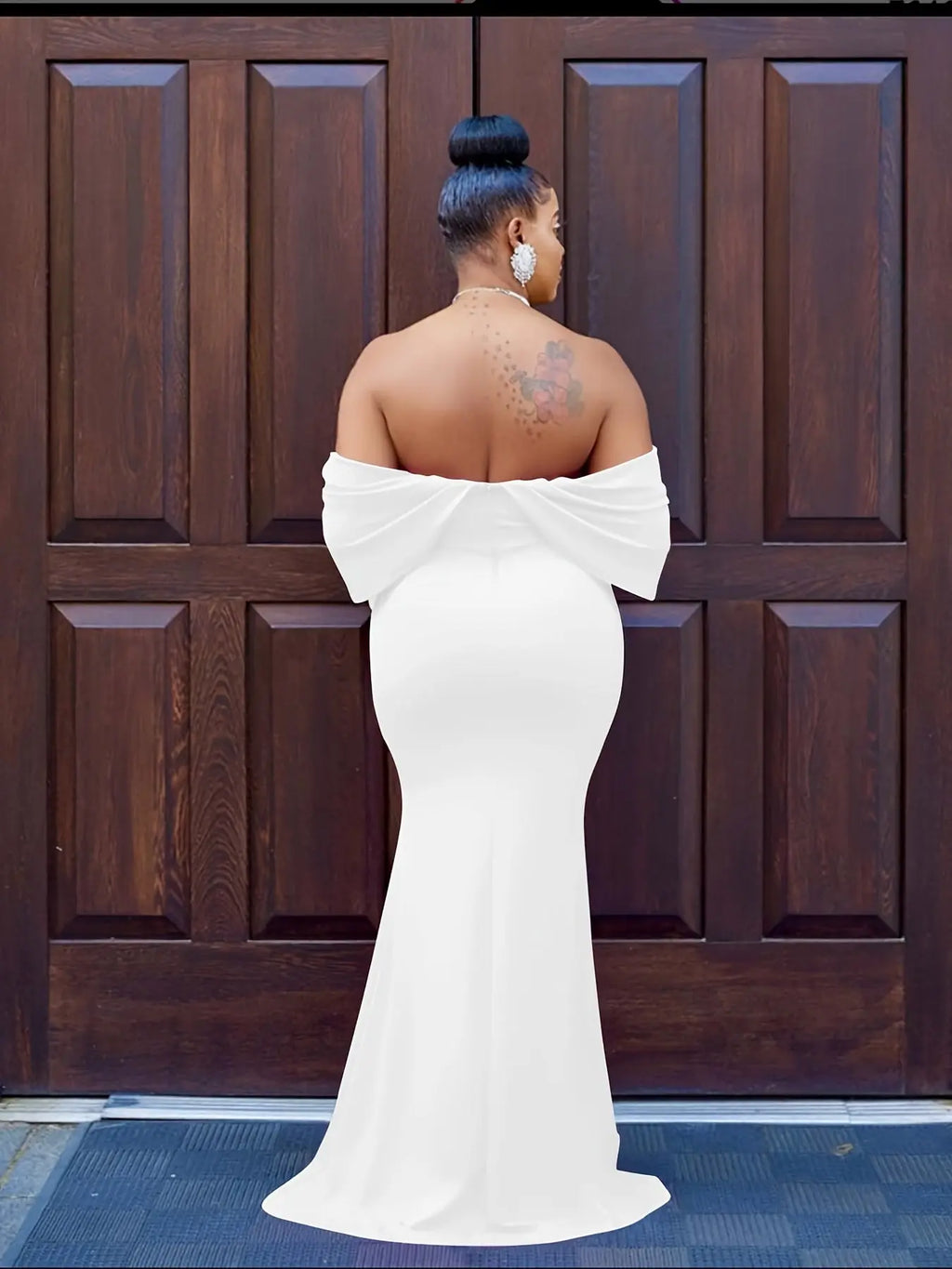 Elegant evening setting featuring the Scarlet Ruffle Dress on a model.