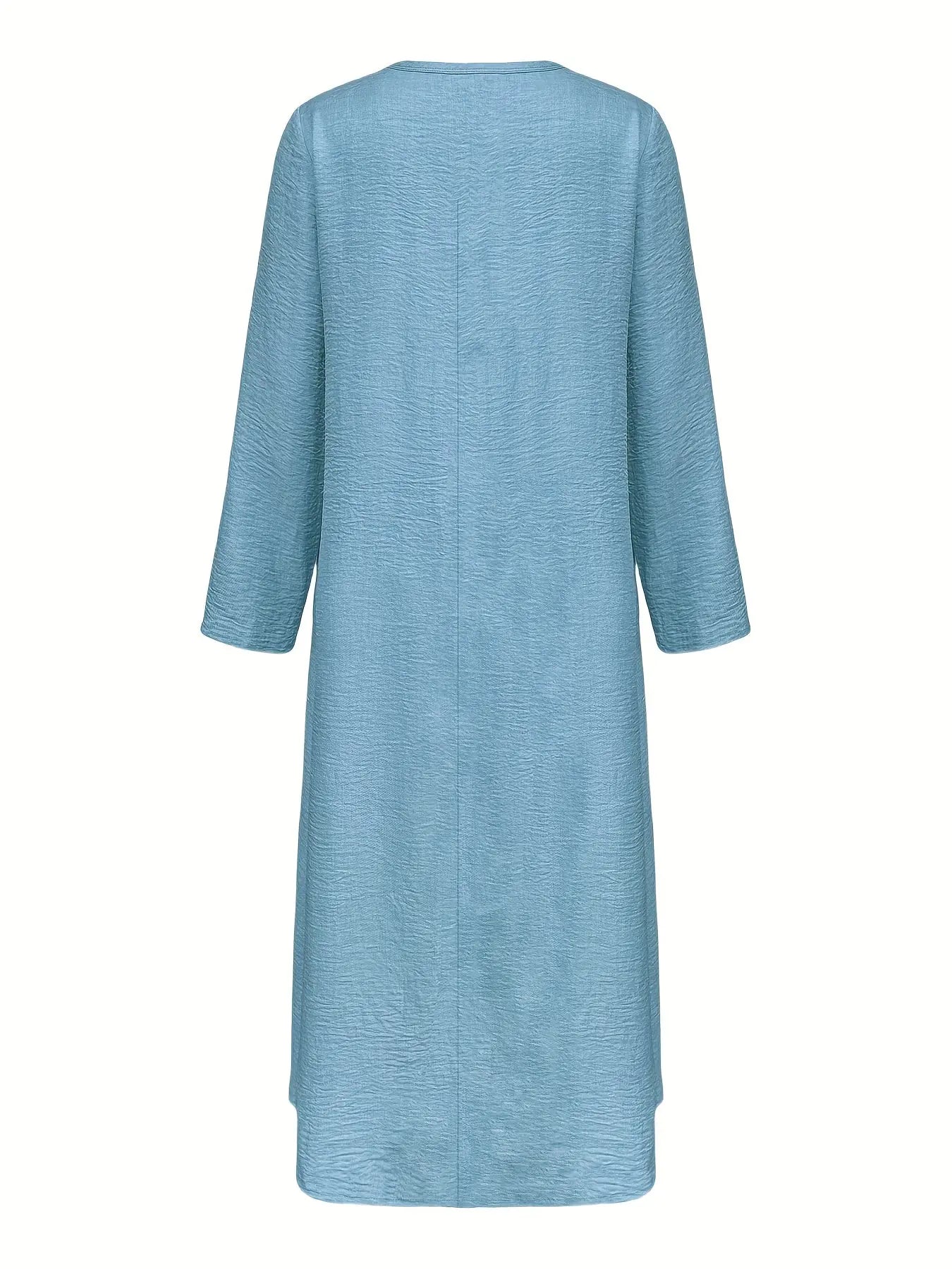 Detail of the v-neckline on the Whisper-Soft Olive Dress, combining style and comfort.