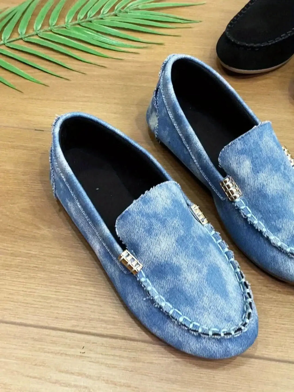 Whisper-soft loafers in black, ideal for professional attire.