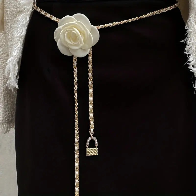 Golden Rose Belt featuring a white rose buckle in gleaming gold-tone metal.