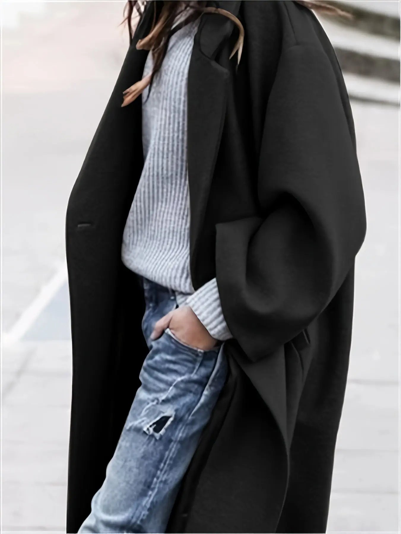Stylish winter coat featuring a structured collar for added drama.