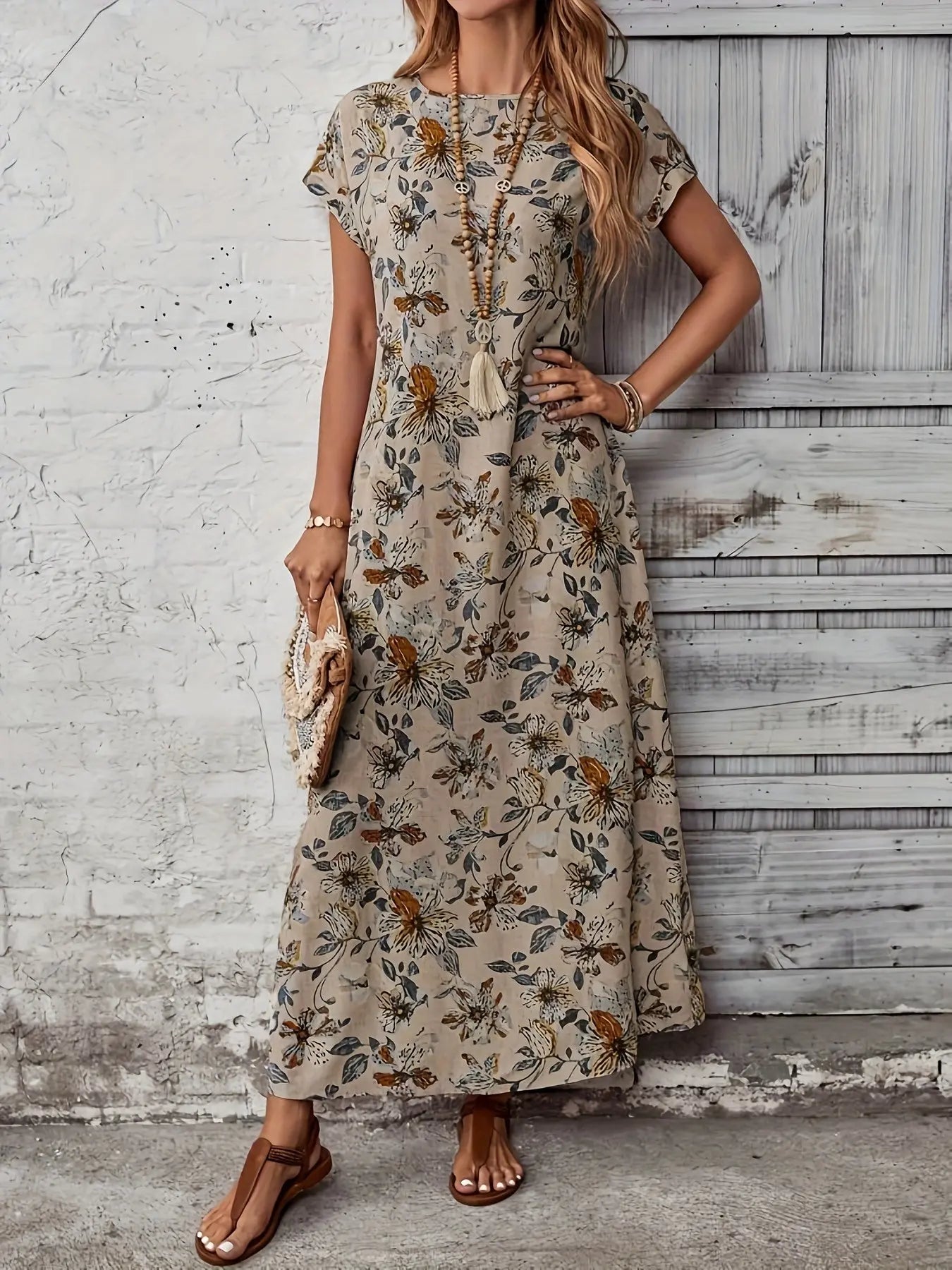 Back view of the Whisper-Soft Floral Dress, highlighting the lightweight material and subtle crew neck.