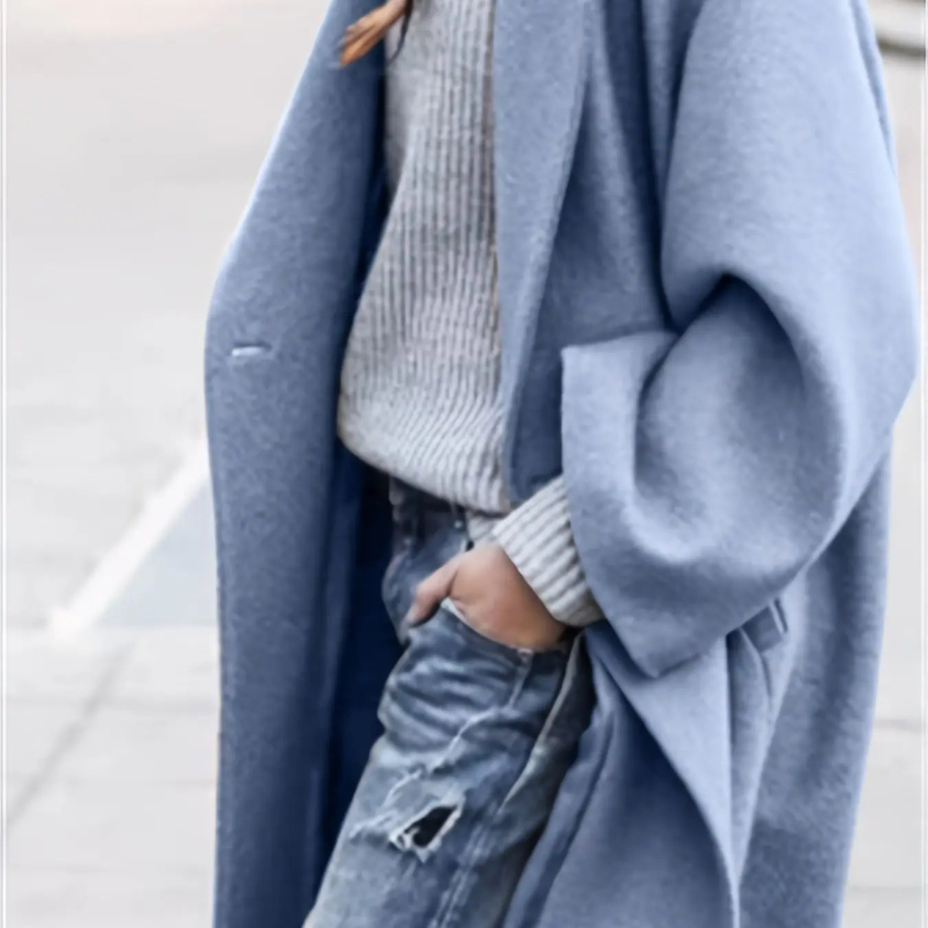 Stylish blue jacket made from breathable material, ideal for crisp days.