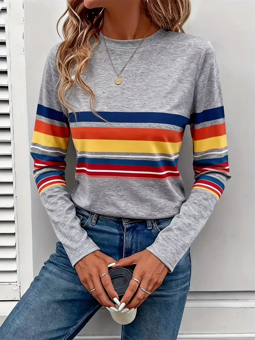 Radiant Stripes Tee in vibrant pink, beige, yellow, navy, and white stripes, made from soft polyester blend.
