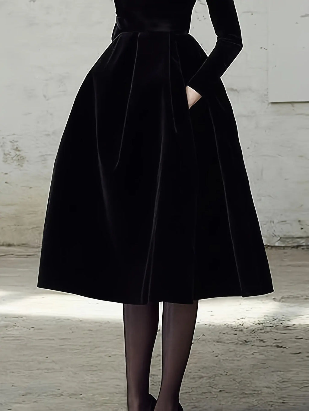 Close-up of the gown's seamless stitching and discreet side pockets, blending luxury with functionality.