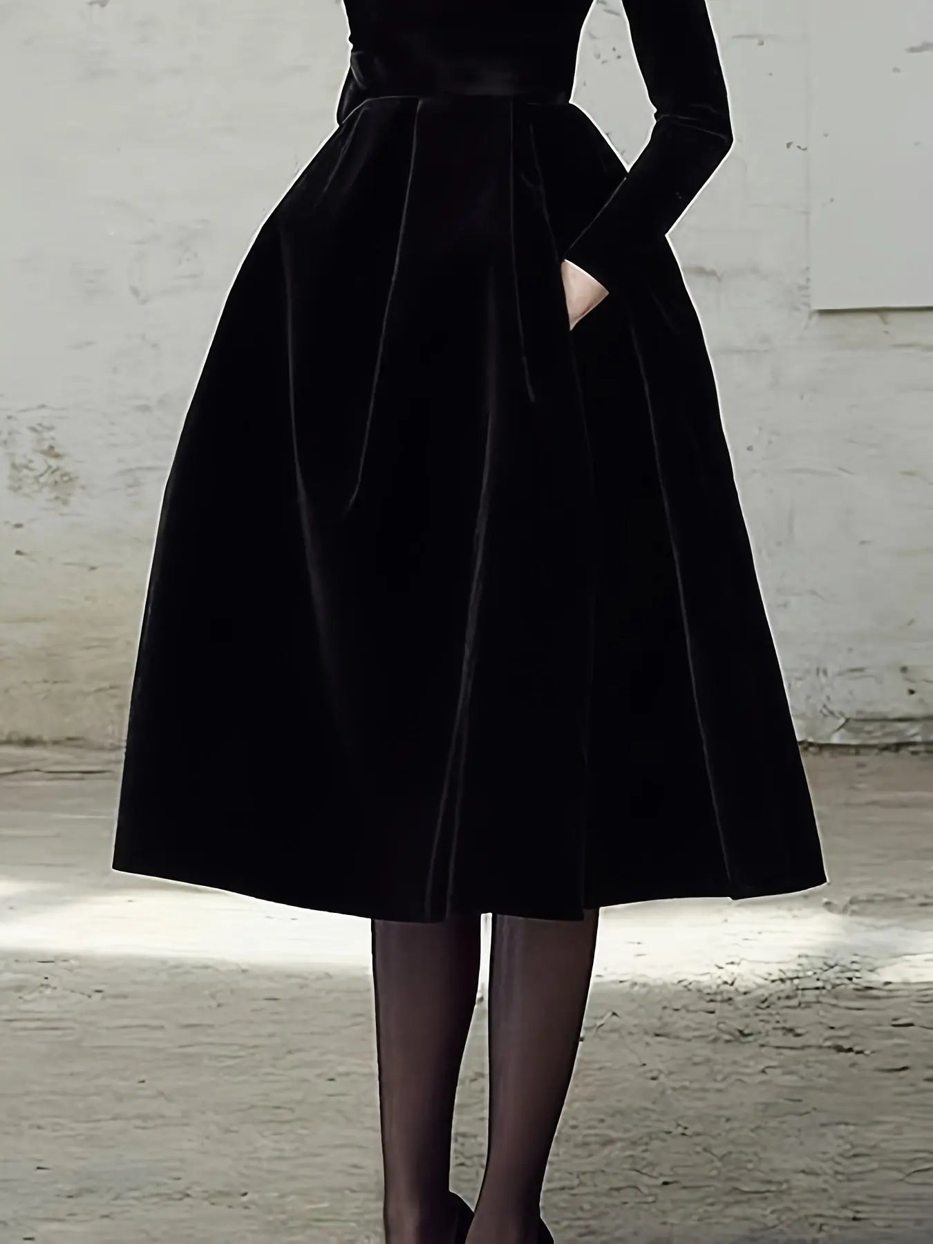 Close-up of the gown's seamless stitching and discreet side pockets, blending luxury with functionality.