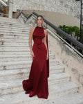Elegant burgundy satin gown, ideal for formal events and glamorous nights out.