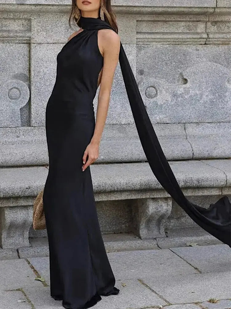 Close-up of the empire waistline on the Midnight Allure Halter Gown.