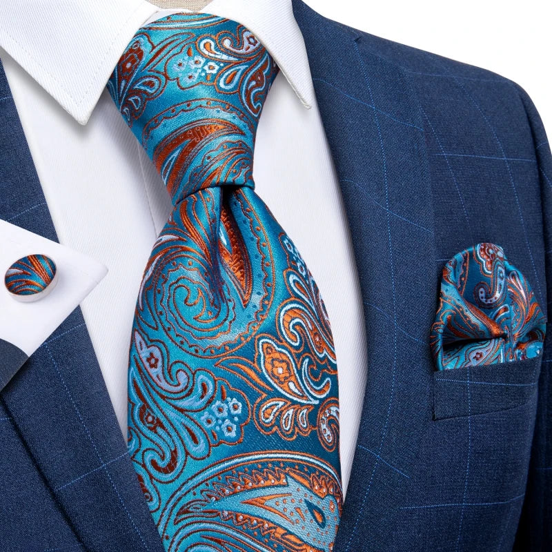 Refined Elegance Silk Paisley Tie Set with matching pocket square in blue and red patterns