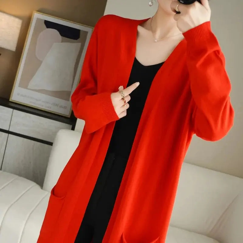 Elegant V-neck detail on the Cashmere Embrace cardigan, enhancing sophistication.