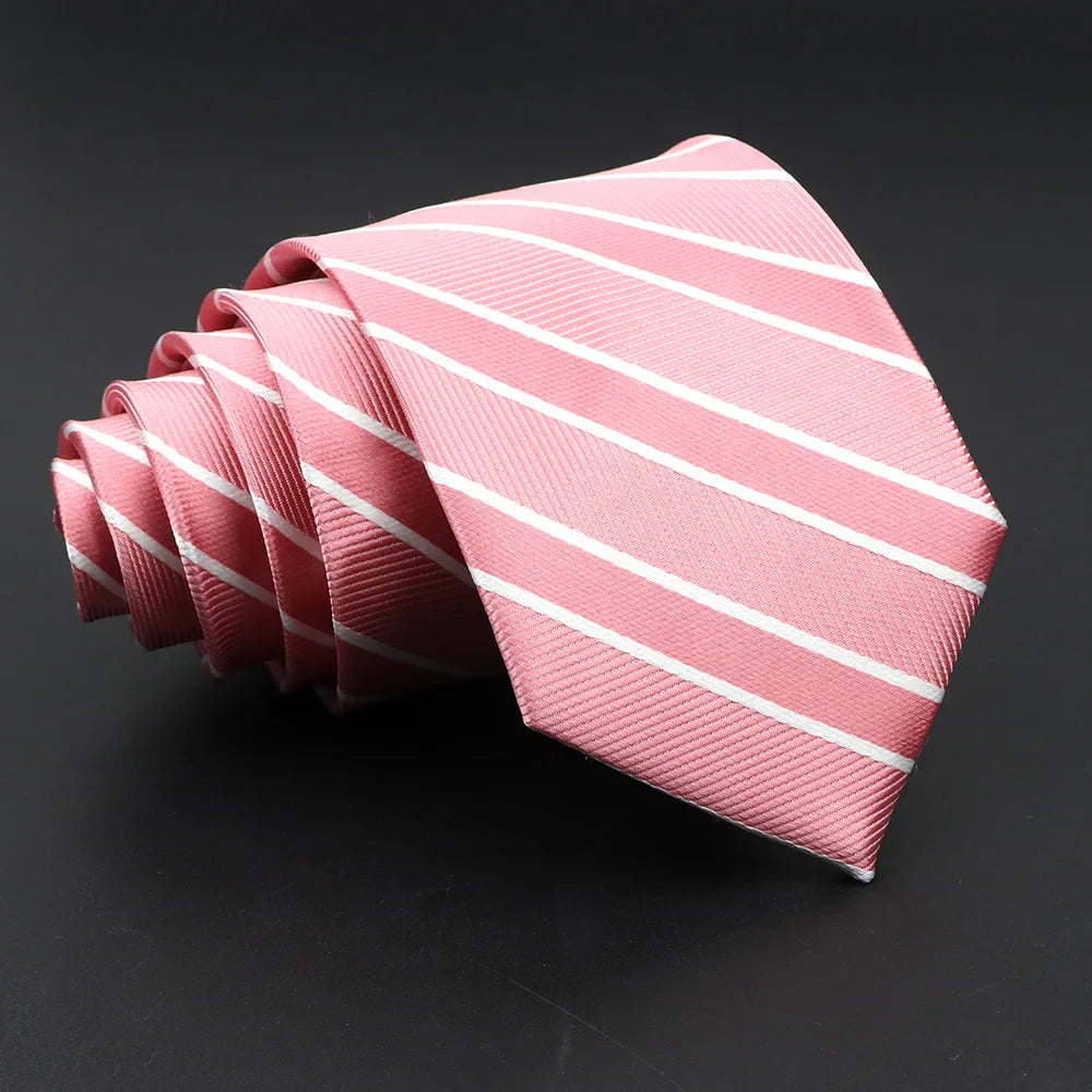 Slim profile striped tie with intricate jacquard pattern and elegant drape