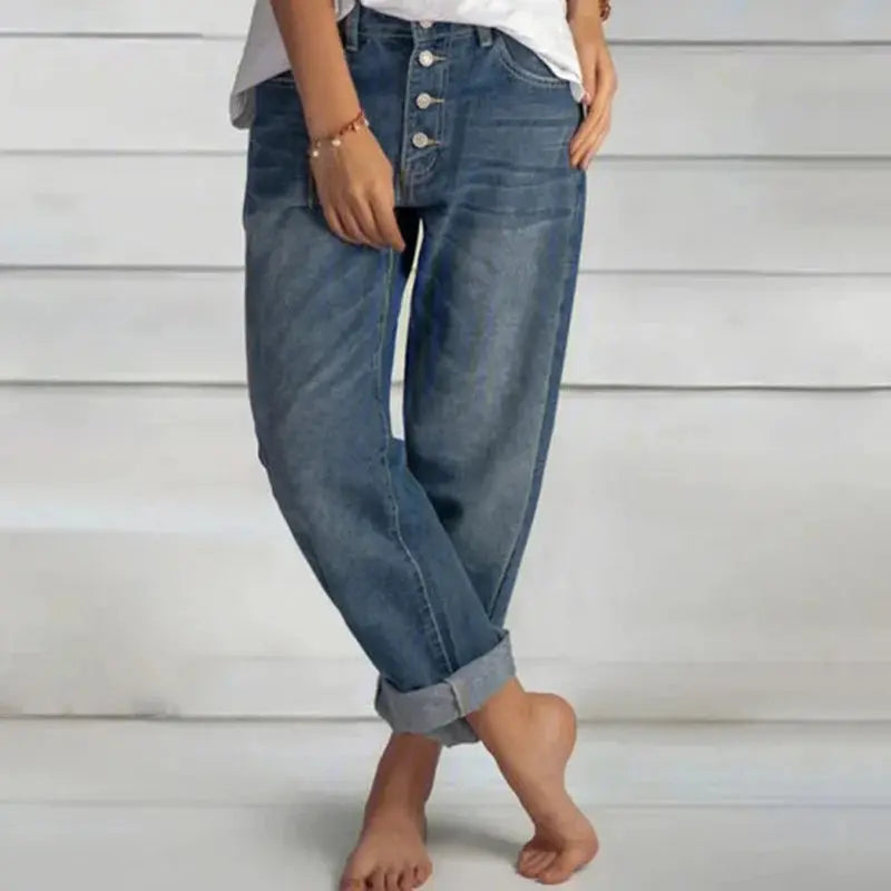 Close-up of breathable cotton fabric of Sunlit Mornings wide-leg jeans, showcasing relaxed fit and comfort.