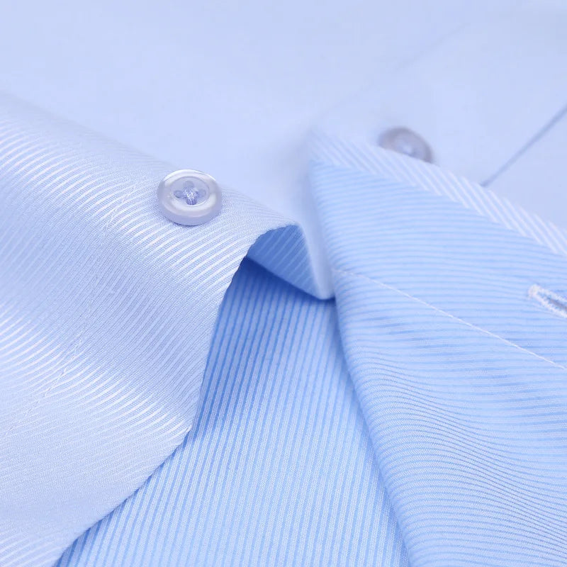 Black French cuff formal shirt with coordinating cufflinks displayed flat lay