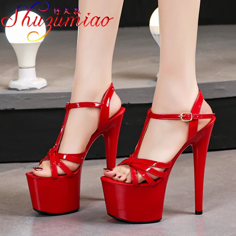 Dramatic 17cm red stiletto heels featuring cross-belt buckle straps and open platform design