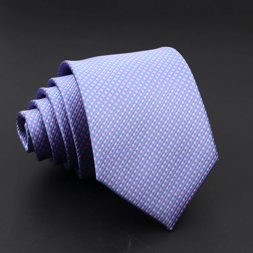 Sleek jacquard stripe necktie with modern proportions and elegant drape