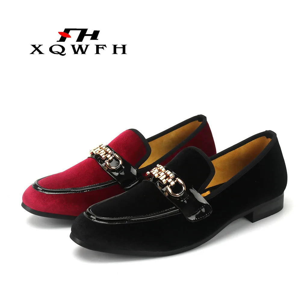 Red velvet loafers with metal accents for a sophisticated look.