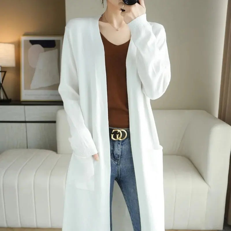Whisper-soft cardigan in navy, ideal for casual coffee dates.