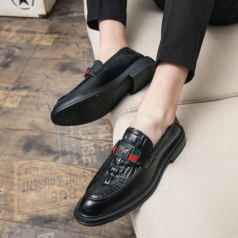 Close-up of genuine crocodile-textured leather loafer showing luxurious surface detail