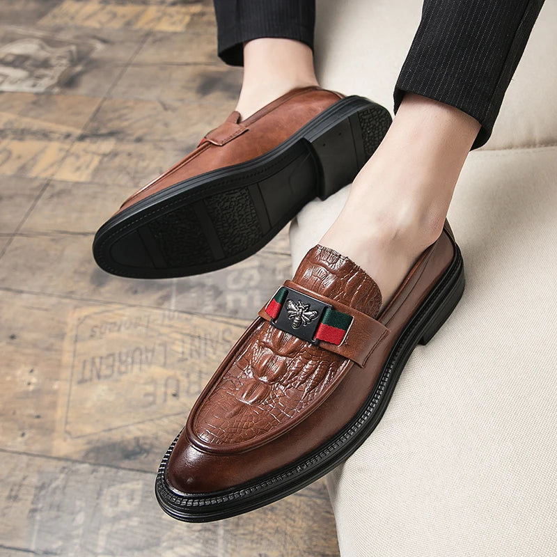 Side view of executive crocodile leather slip-on loafer with cow leather lining