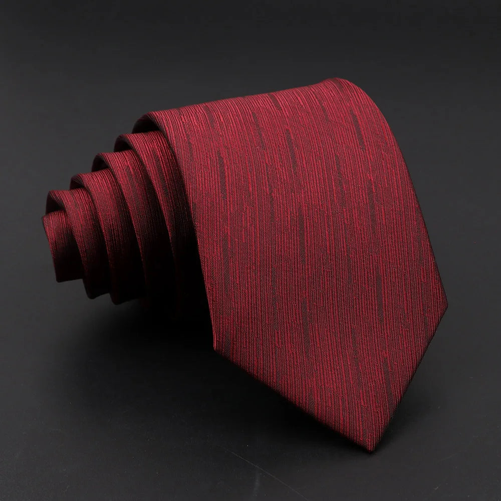 Formal striped tie in narrow width with intricate jacquard woven pattern