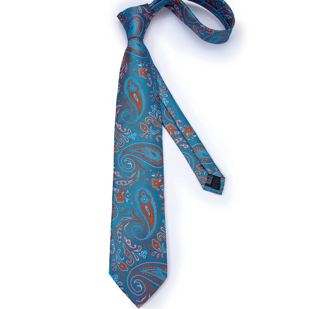 Formal men's tie set with sophisticated paisley pattern and coordinated accessories
