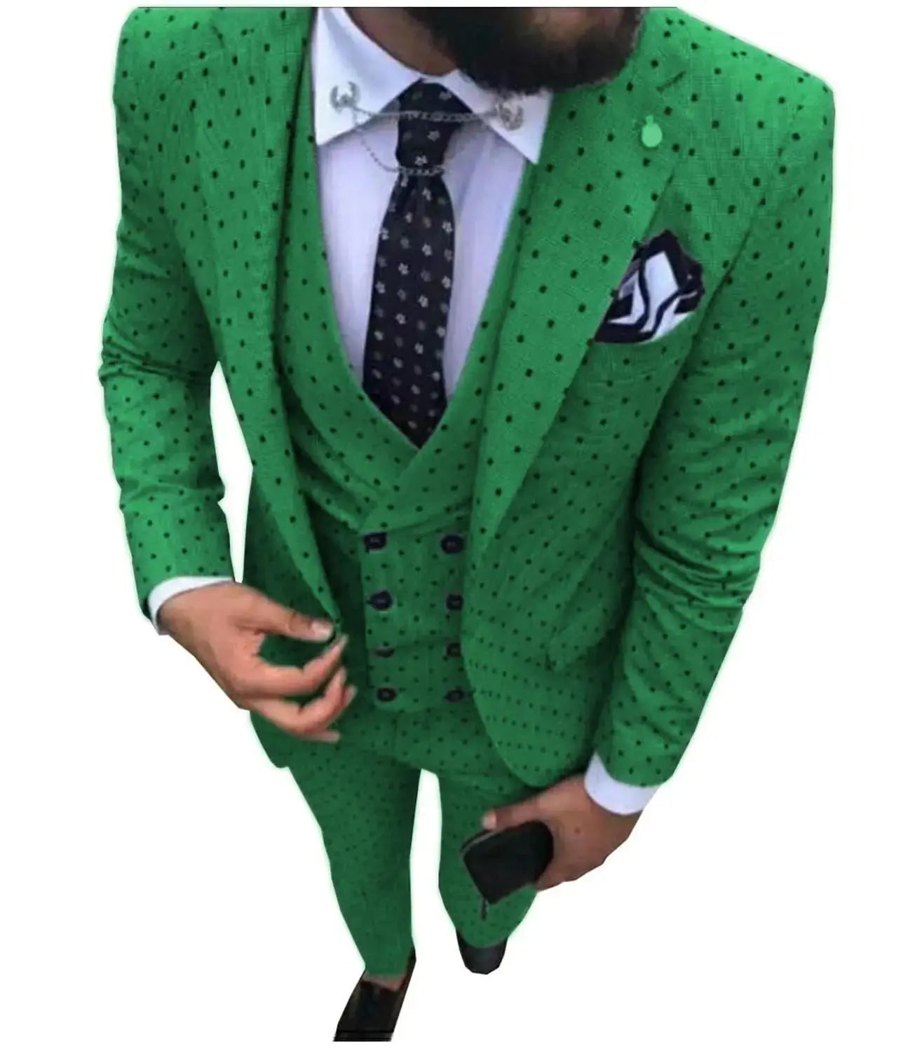 Three-piece suit displayed with accessories for a complete outfit.
