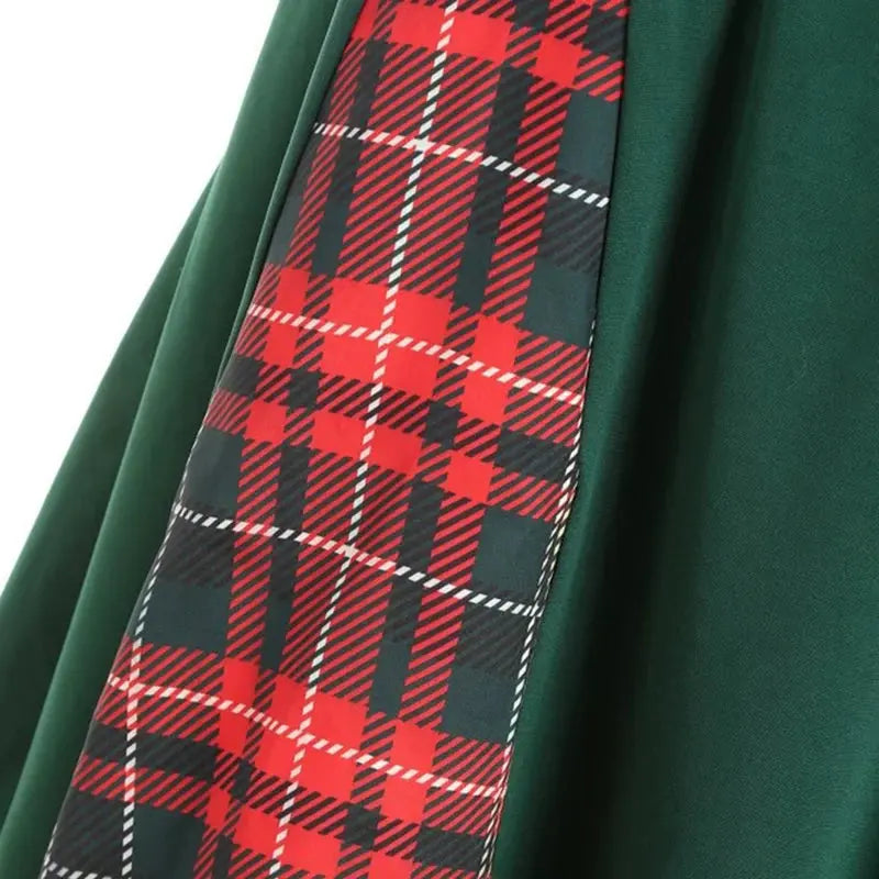 Flat lay of the red plaid midi dress with accessories for a daytime wedding outfit.