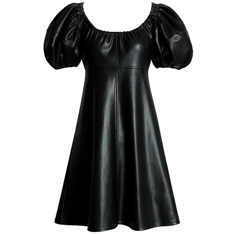 Model wearing knee-length luxe lantern sleeve dress, showcasing elegant silhouette.