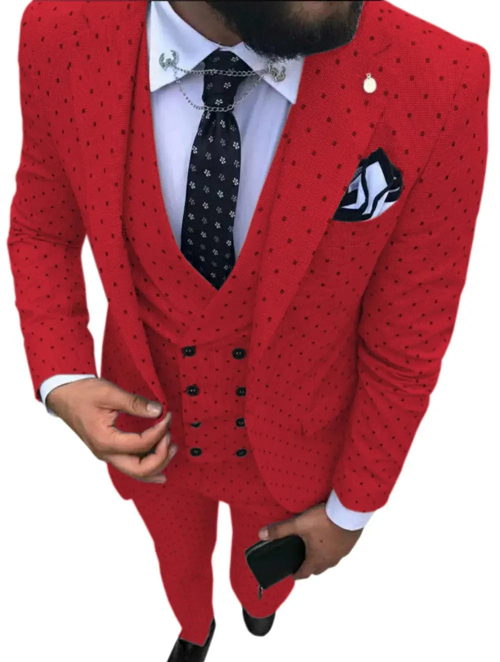 Full view of the three-piece suit highlighting the fitted trousers.