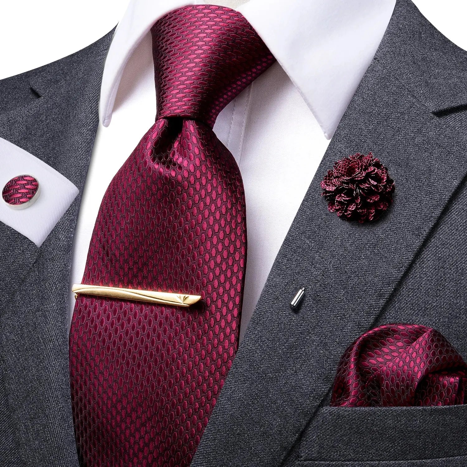 Silken tie set showcased against a formal shirt background.