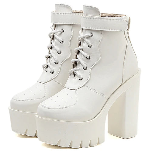 Fashion-forward black heeled boots with square toe, platform base, and adjustable straps