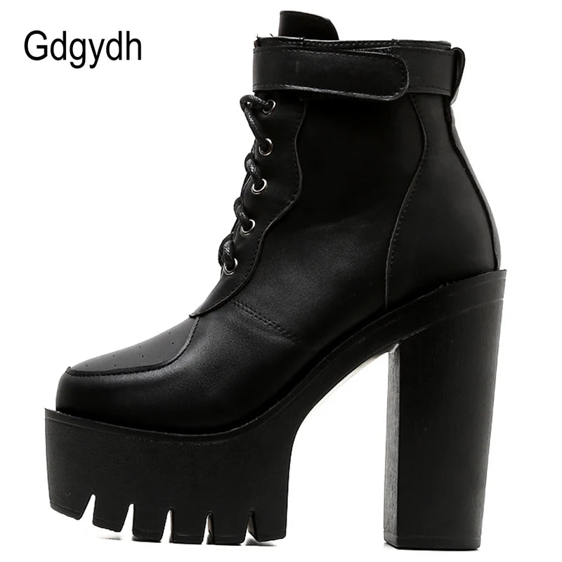 Women's black PU leather ankle boots featuring lace-up front and decorative buckle detail