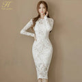 Detail shot of high-quality lace fabric on women's formal dress, exuding timeless sophistication.