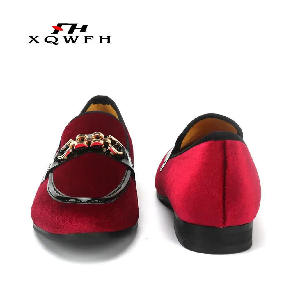 Red velvet loafers on display, highlighting slip-on convenience.