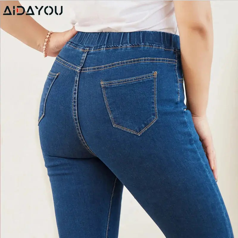 Full-length view of Curvy Comfort Denim in light wash, perfect for casual chic outfits.
