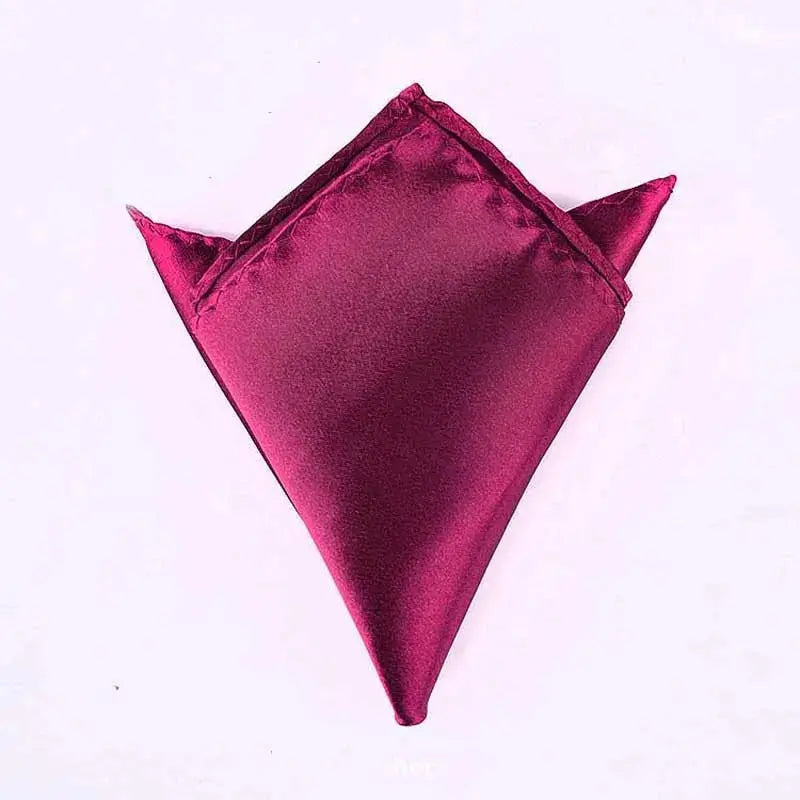 Elegant pocket square in pastel pink, perfect for formal dinner events.