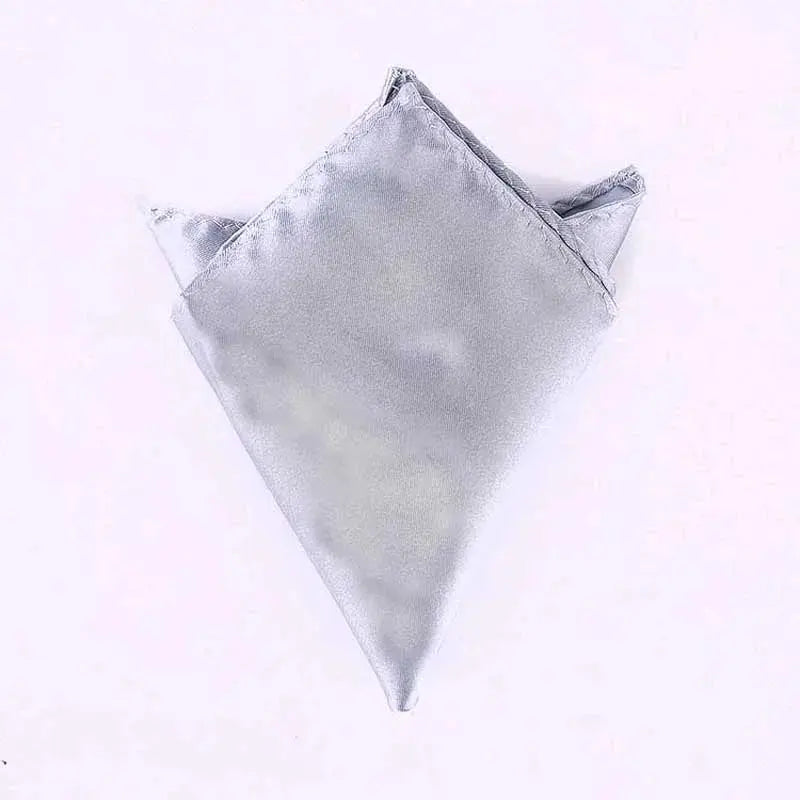 Silken pocket square in bright yellow, a bold statement accessory.