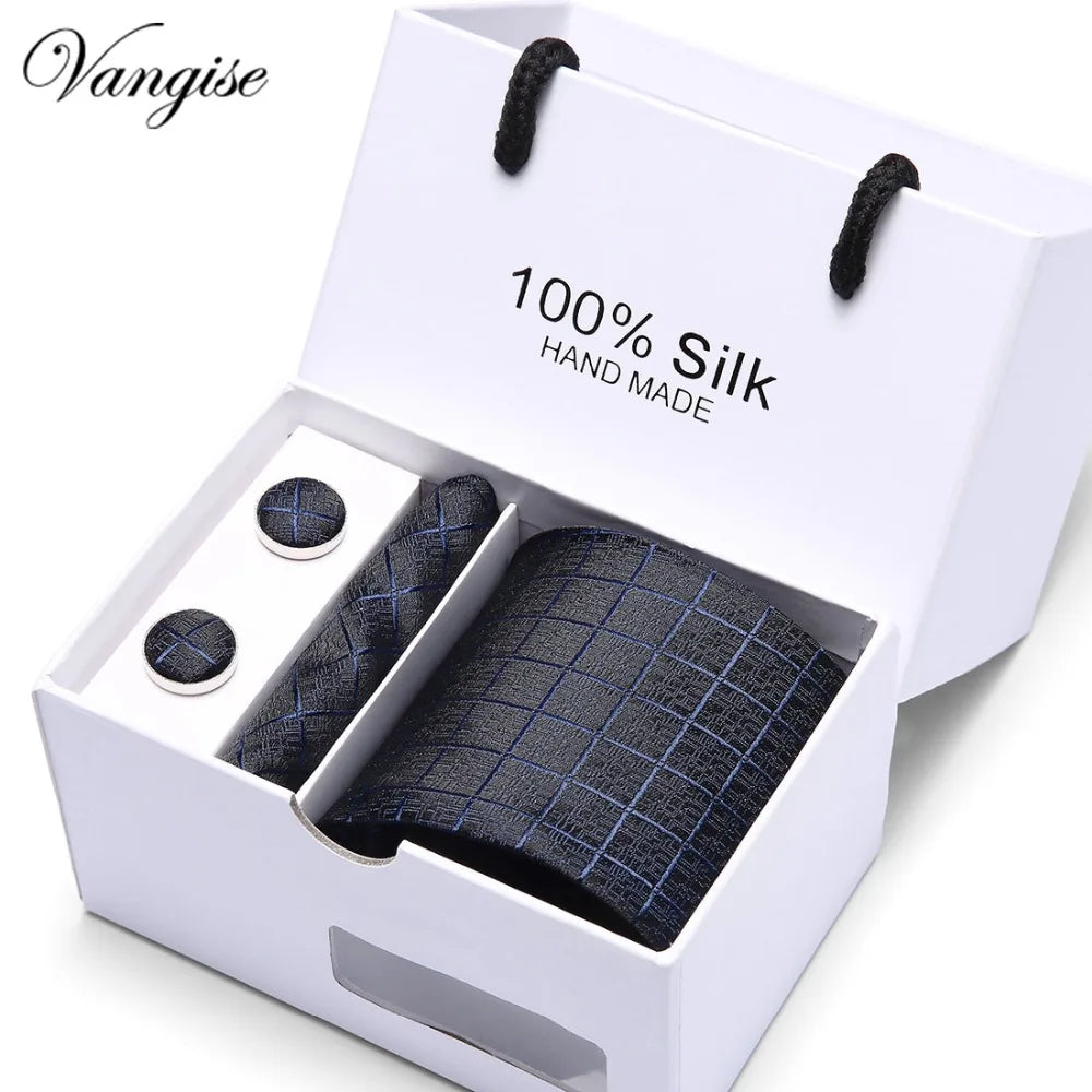 Red silk tie with Jacquard weave, featuring a subtle plaid pattern.