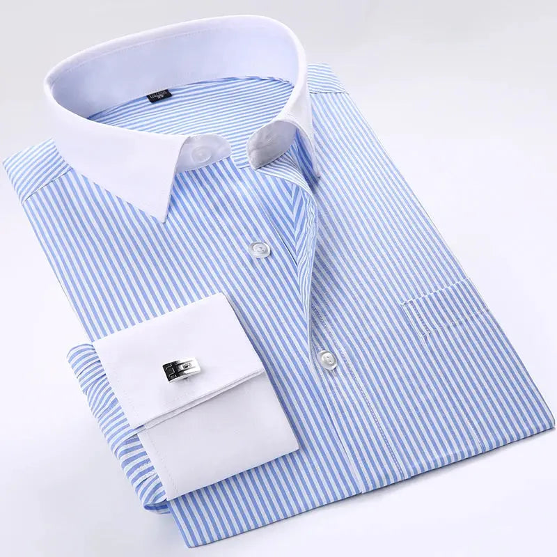 Model wearing a striped cufflink shirt, exuding sophistication and style in a professional setting.