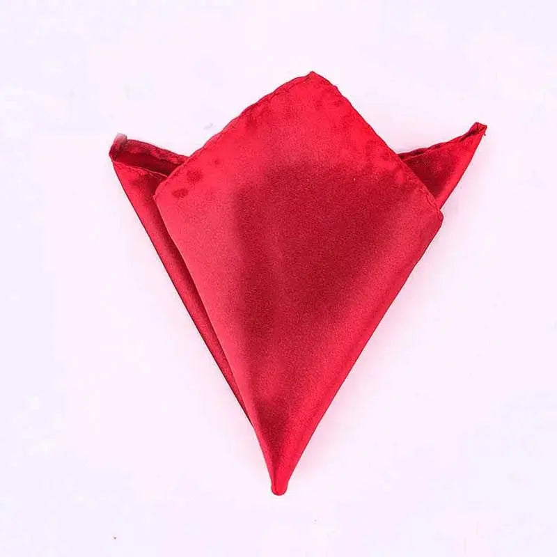 Pocket square in deep teal, lightweight and resistant to wrinkles.