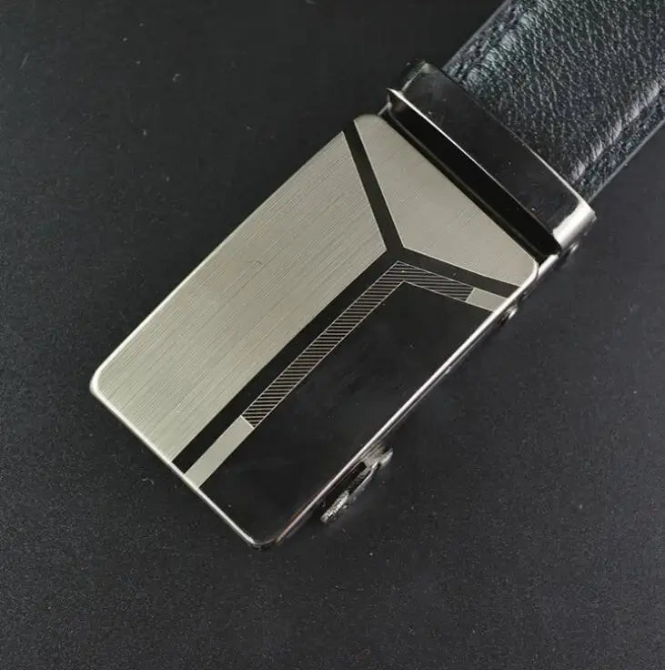 Sleek black belt with automatic buckle for versatile styling.