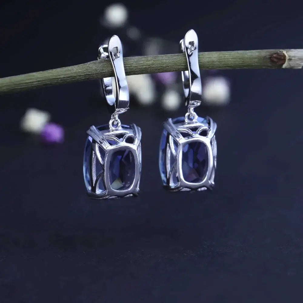 Luxury women's jewelry featuring captivating Iolite Blue Mystic Quartz earrings.