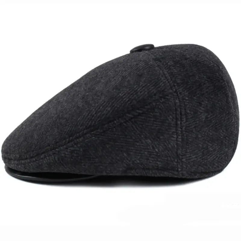 Warm wool blend beret with earflaps, designed for comfort during frosty days.